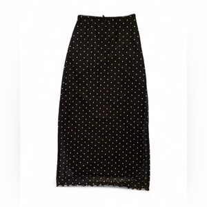 Black and white polka dot skirt with bow in size XS. New.